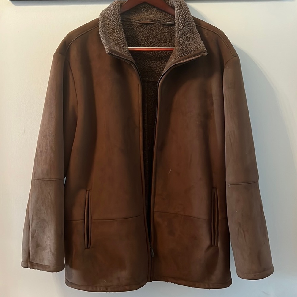 Brown X-Large leather jacket with fleece interior.